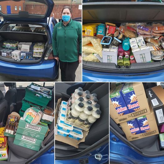 Lady with car boot full of food